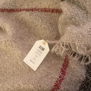 Soft plaid print poncho.